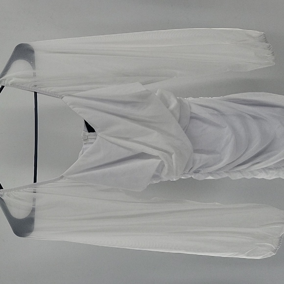 Elegant White Dress With Semi Transparent Sleeves - Picture 10 of 16